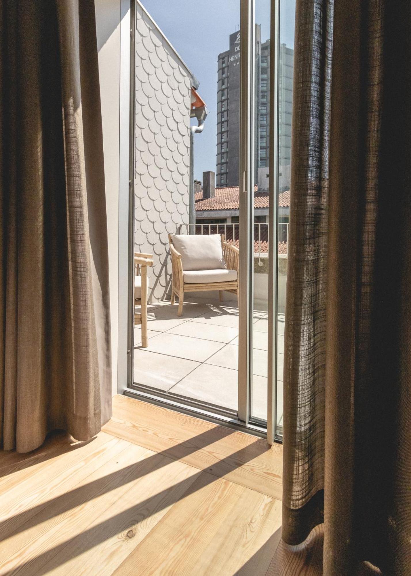 Village Aparthotel By Boa Porto Cameră foto A sliding door